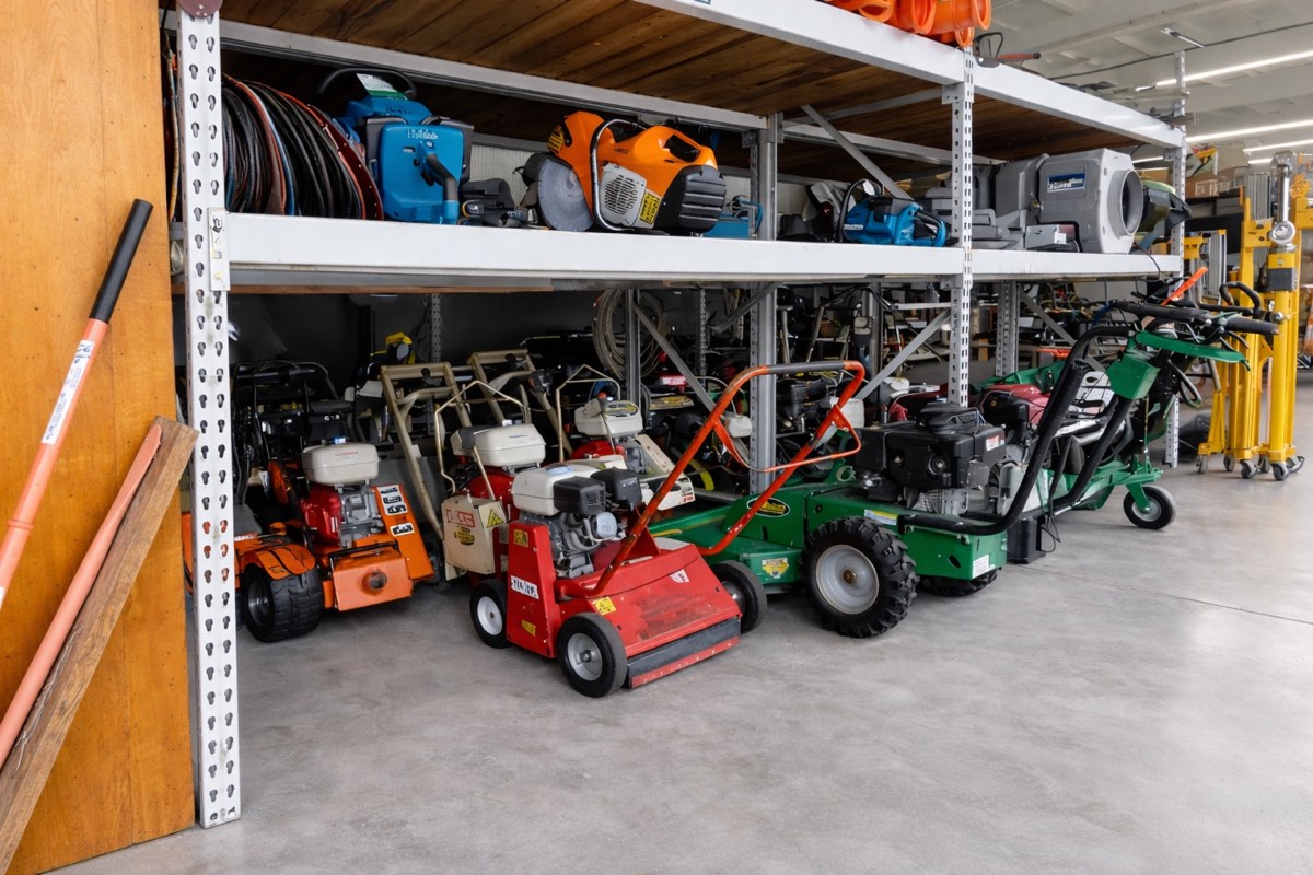 Warehouse shelves full of rental equipment